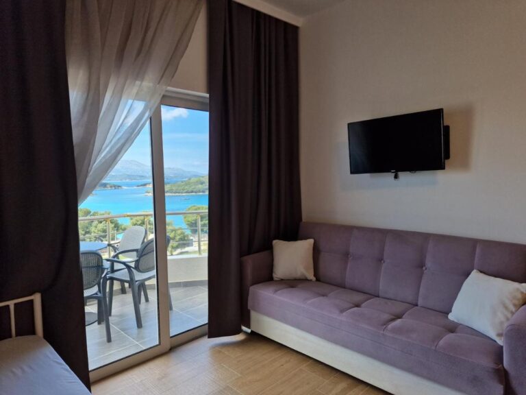 Hotel Queen Margaret Seaside in Ksamil livingroom and balcony