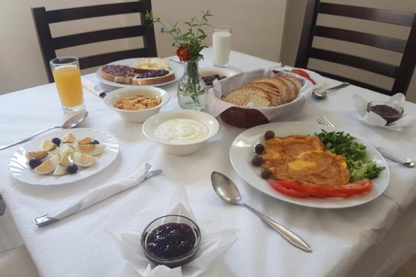 perivolos apartments in albania the breakfast table where you start the day